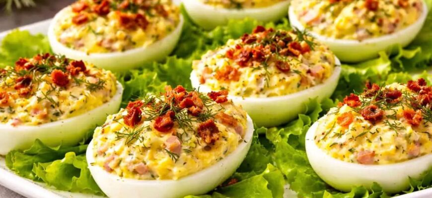 "Польські" фаршировані яйця на Великдень: ця закуска зникне зі столу за секунди "Польські" фаршировані яйця на Великдень: ця закуска зникне зі столу за секунди