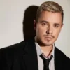 Співака Вадима Олійника запідозрили в мобілізації через фотографії у формі та зі зброєю